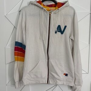 Aviator Nation White Zip Hoodie with Blue, Red, Orange & Yellow Stripe Sleeve